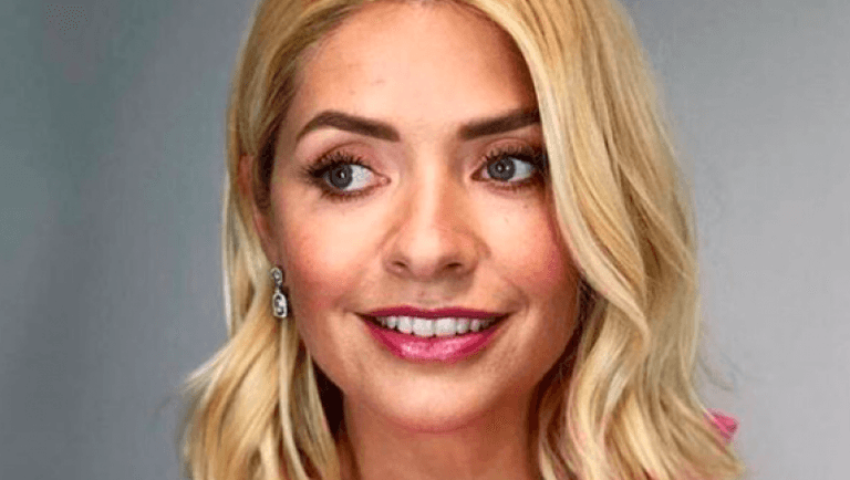 Holly Willoughby’s black dress is from Sandro Paris and we’re insanely in love Holly Willoughby’s black dress is from Sandro Paris and we’re insanely in love