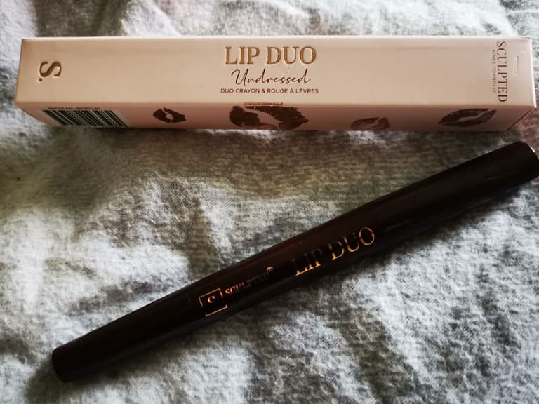 The new Sculpted by Aimee lip duo is a handbag must have The new Sculpted by Aimee lip duo is a handbag must have