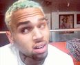 Chris Brown Debuts Another Ugly Tattoo in The Same Place as Rihanna’s