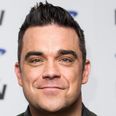 Robbie Williams Says He Is Still Part of Take That