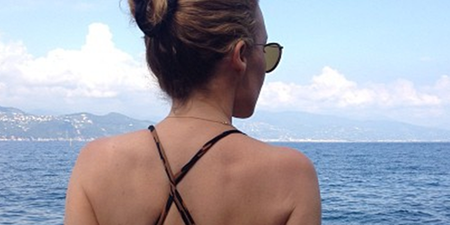 Singer Shows Off Famous Derriere In Holiday Snap