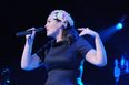 Singer Postpones Tour After Pregnancy Revelation