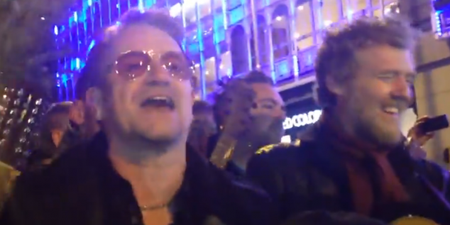 VIDEO: Glen Hansard And Bono Spread Some Christmas Cheer Busking On Grafton Street