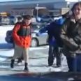 VIDEO: Dad Laughs At School Kids Falling On Ice