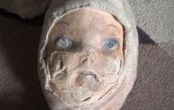 Looking For A Haunted Old Doll? There’s One For Sale On eBay!