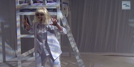 WATCH: Sia Performs “Chandelier” Facedown On A Bed While Lena Dunham Dances Around Her