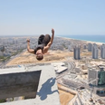 WATCH: Man Backflips On Concrete Construction 40 Floors Up For The Craic… Doesn’t Exactly Go To Plan