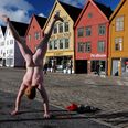 A Sight To See! Ballsy Tourist Travels Across The Globe Performing Naked Handstands at Landmarks