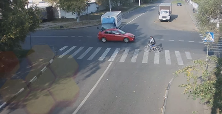 WATCH: CCTV Footage Captures Cyclist Miraculously Cheating Death Twice