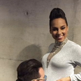 PICTURE: Alicia Keys Shares Sweet Snap Of Bono Kissing Her Baby Bump