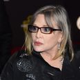 Carrie Fisher suffers heart attack on flight