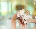 This Could Be Why Your Hair Always Feels Greasy (It’s Not Your Conditioner)