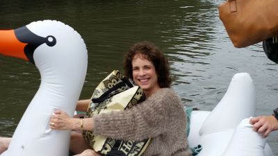 This picture of a truly dedicated midwife on an inflatable swan is going viral