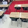 Teacher writes inspirational messages on student’s desks on exam day