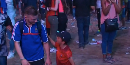 This young Portuguese fan consoling a French fan is too much