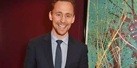 Tom Hiddleston has finally revealed why he was wearing THAT Taylor Swift t-shirt