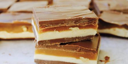 These no-bake Snickers slices are heaven in a pan