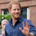 These pictures of Prince Harry playing with a baby gives us all the feels