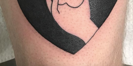 This tattoo of a hand and a heart looks like a hand and… something else