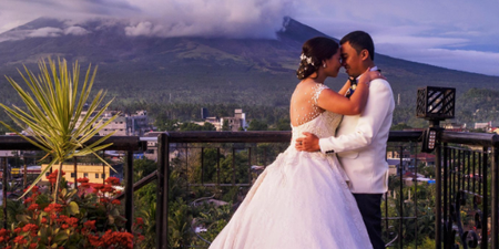 This couple took their wedding pictures in front of an erupting volcano