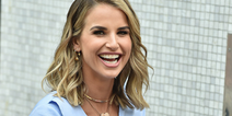 Glowing Vogue Williams shows off her bare bump on Irish magazine cover