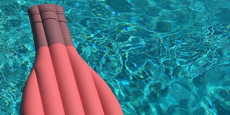 This wine bottle pool float is exactly what we need this summer