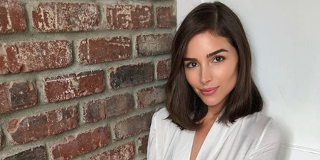 Olivia Culpo wore a Zara jumpsuit dress over the weekend and it’s minimalist chic
