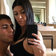 Kourtney Kardashian’s boyfriend calls out publication over snap with ‘mystery ladies’