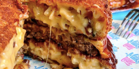 This mac and cheese burger has pasta for buns and we are ready for it to be within us
