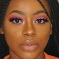 Woman takes extremely glam mugshot and we need a tutorial as soon as