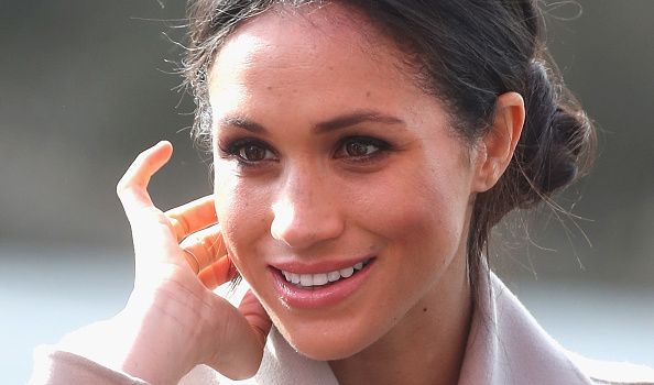 Fans can't stop talking about what Meghan was carrying when she landed in Australia