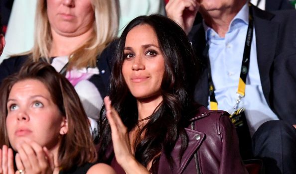 Sorry, what? Meghan Markle was just spotted picking up her dog's poo outside Kensington Palace