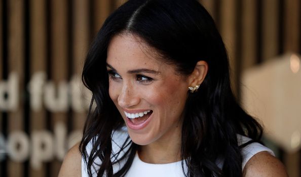 Meghan just wore a fab tuxedo dress to make a speech - but we're OBSESSED with her shoes