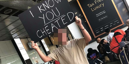 Man waits at airport with ‘I know you cheated’ sign for partner and holy mother of God