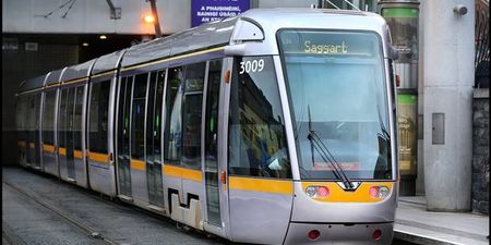 A woman has died after being struck by a Luas tram this morning