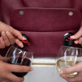 This handbag has two wine spouts and we NEED it for our BFFs