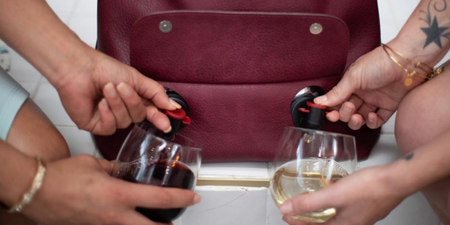 This handbag has two wine spouts and we NEED it for our BFFs