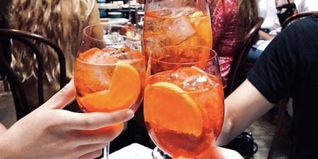 An Aperol Spritz pool party featuring an orange waterfall is happening this summer