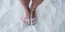 This is the best hack to stop sand sticking to your feet at the beach