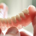 Man inhales false teeth during surgery, has them stuck in throat for eight days