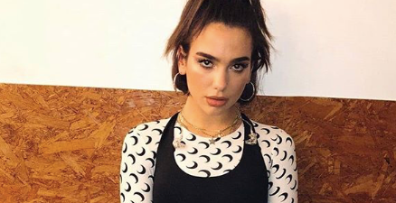 Dua Lipa is bringing out new music and the cover looks like a 90s throwback