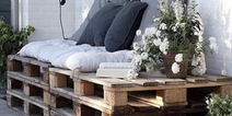 Weekend project: You can DIY this chic garden sofa using old shipping pallets
