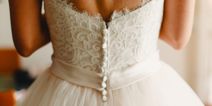 Bride disinvites woman from wedding, still wants to wear her dress