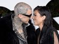 Kourtney Kardashian explains why she kisses Travis Barker….like that