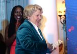 Sandi Toksvig “back home” following hospitalisation in Australia