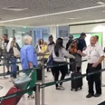 Peppy Dublin Airport worker goes viral for keeping security queue entertained