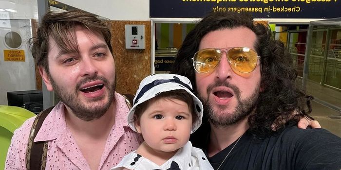 Brian Dowling with husband, Arthur, and baby Blake