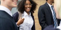 Gender neutral uniforms introduced in school as it welcomes girls for the first time in 135 years