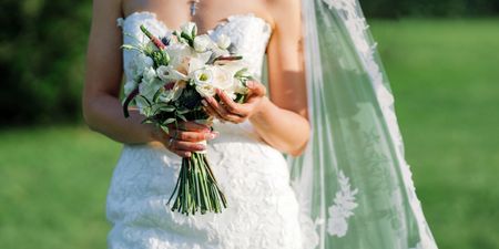 Bride has the best reaction after toddler wipes her face on her wedding dress