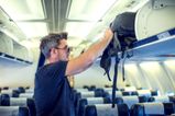 Tourists who stand up too early on plane face fine in new crackdown